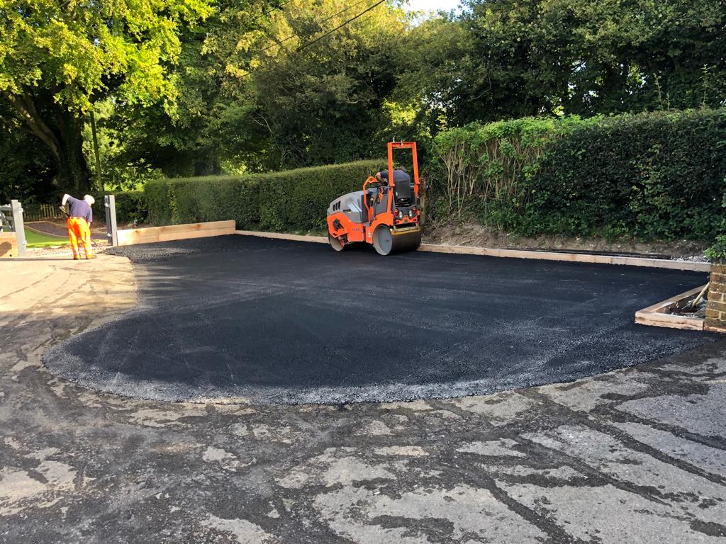 This is a photo of a bitumen driveway which is in the process of being installed by Hornsby Road Tek