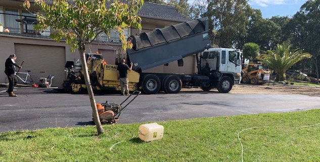 This is a photo of an asphalt driveway which is in the process of being installed by Hornsby Road Tek